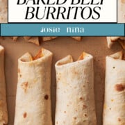 A close-up of crispy beef burritos with golden-brown, crunchy exteriors are neatly arranged on a baking sheet for Pinterest