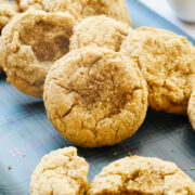 peanut butter cookies on a green plaid tray.