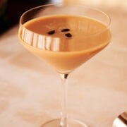 close up of espresso martini in a martini glass.