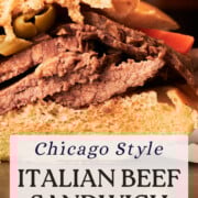 Close-up of a Chicago style Italian beef sandwich, made using an authentic Chicago Italian beef recipe, with sliced beef, green peppers, and bread.