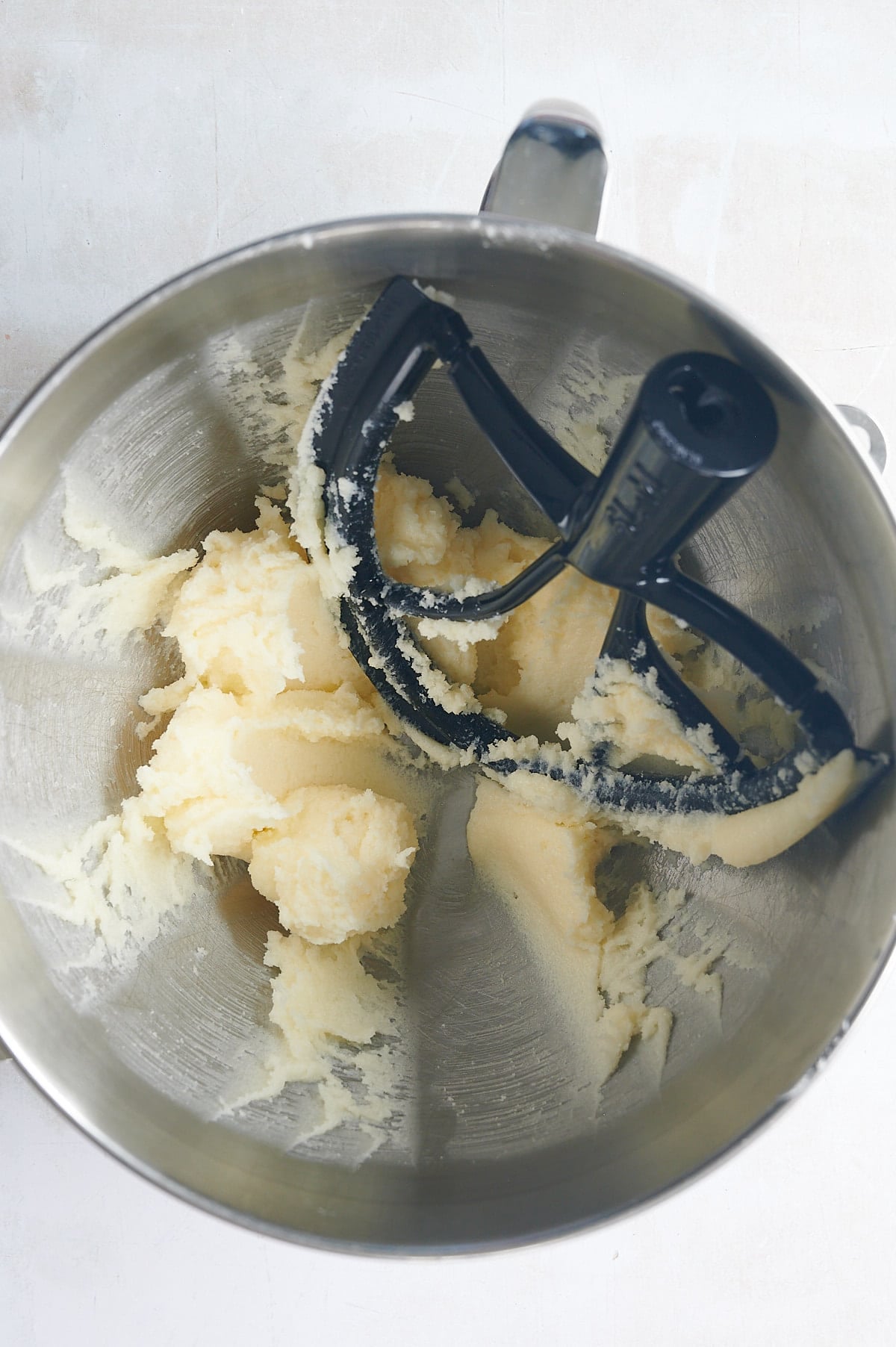 creamed butter and sugar in mixing bowl for lemon knot cookies