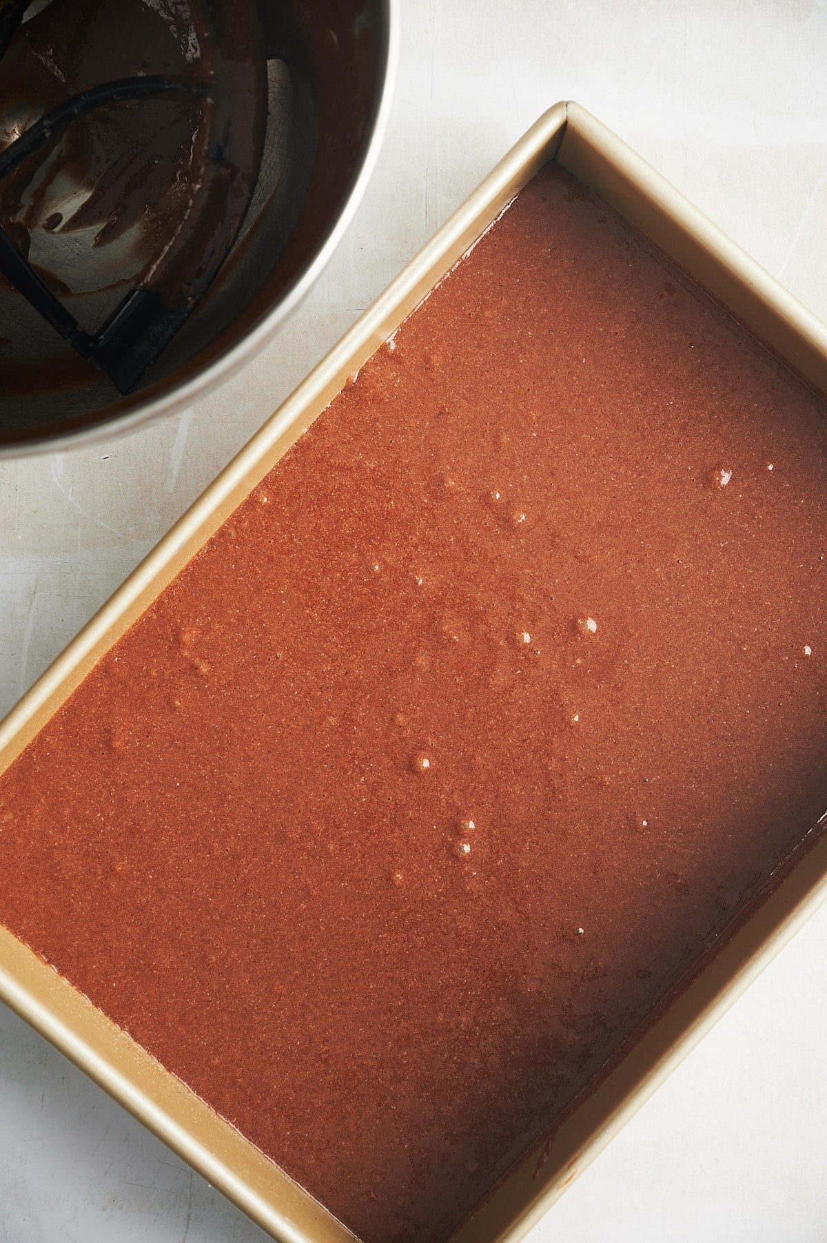 mint brownie batter poured in 9x13 pan.