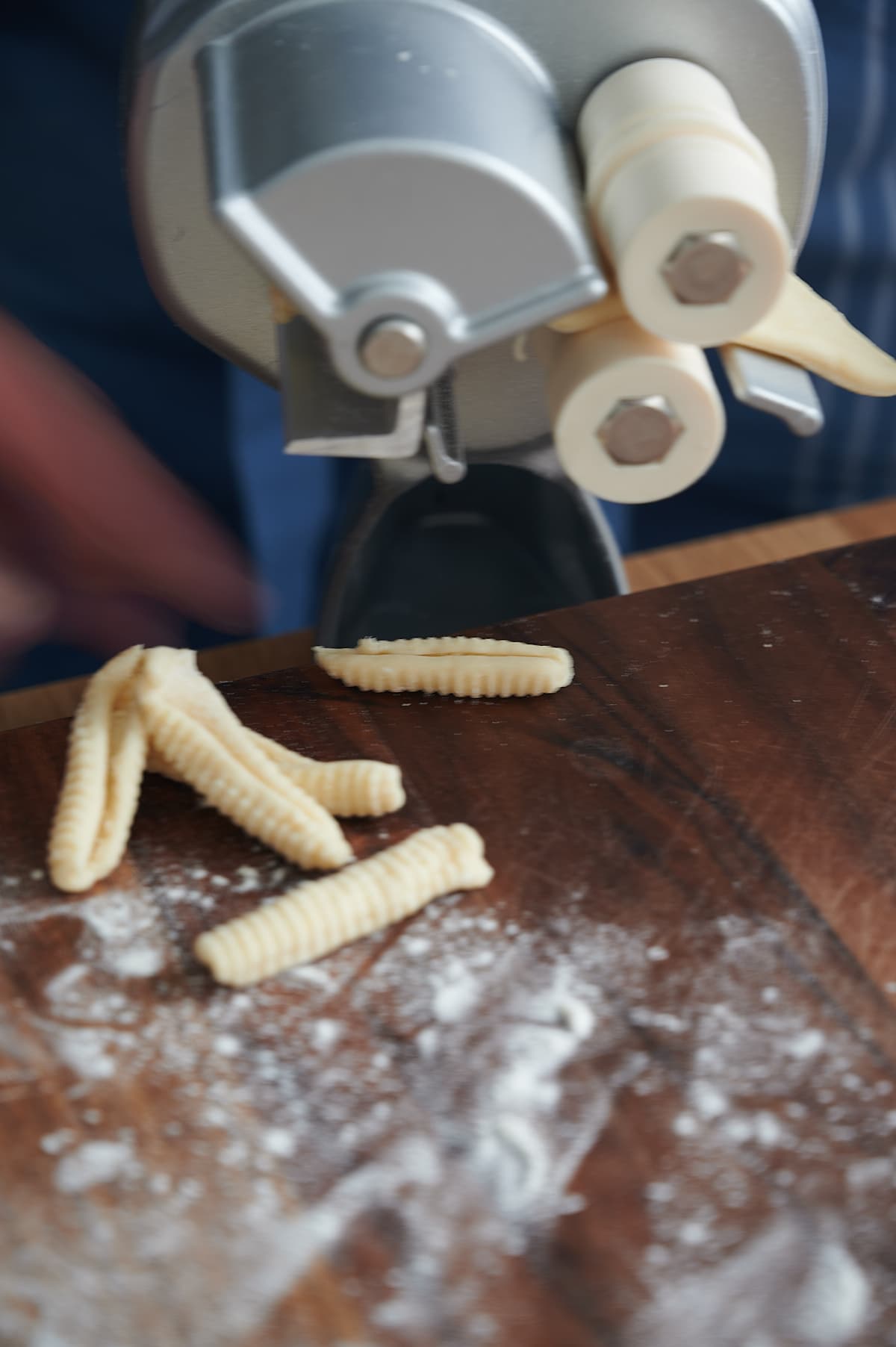 cavatelli pasta after being made on machine