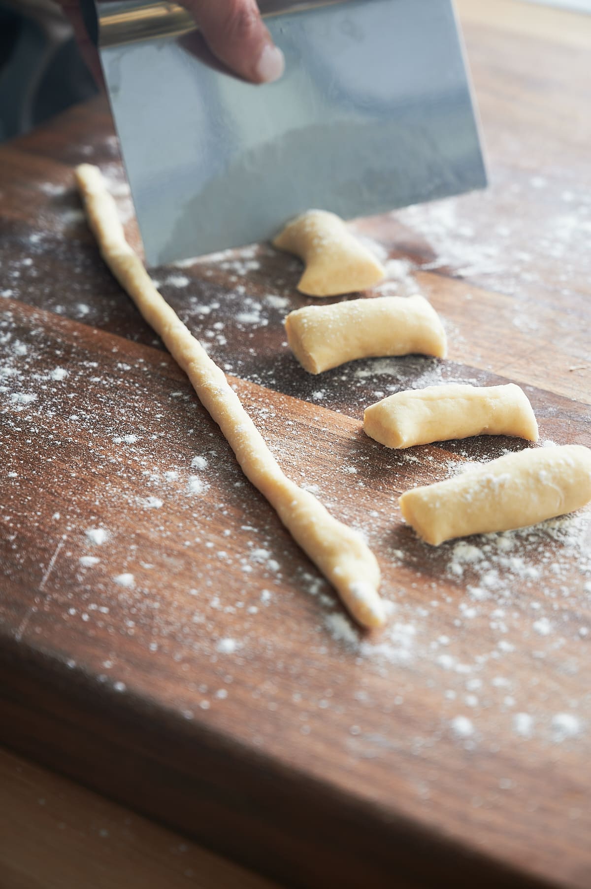cutting rope of pasta dough for cavatelli.