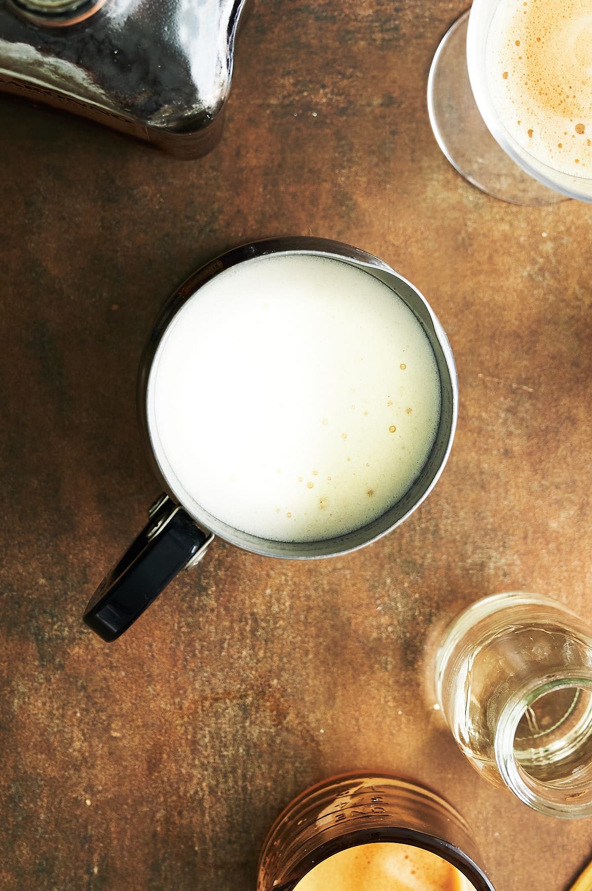 milk frother with frothed milk for coffee.