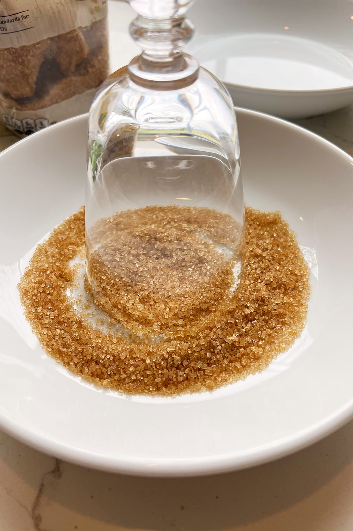 glass being dipped in sugar for rim