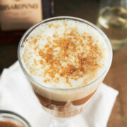 finished glass of amaretto coffee with demerara sugar topping.