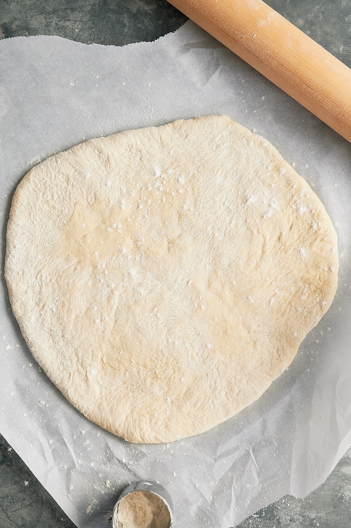 Pizza dough rolled for Bolognese pizza