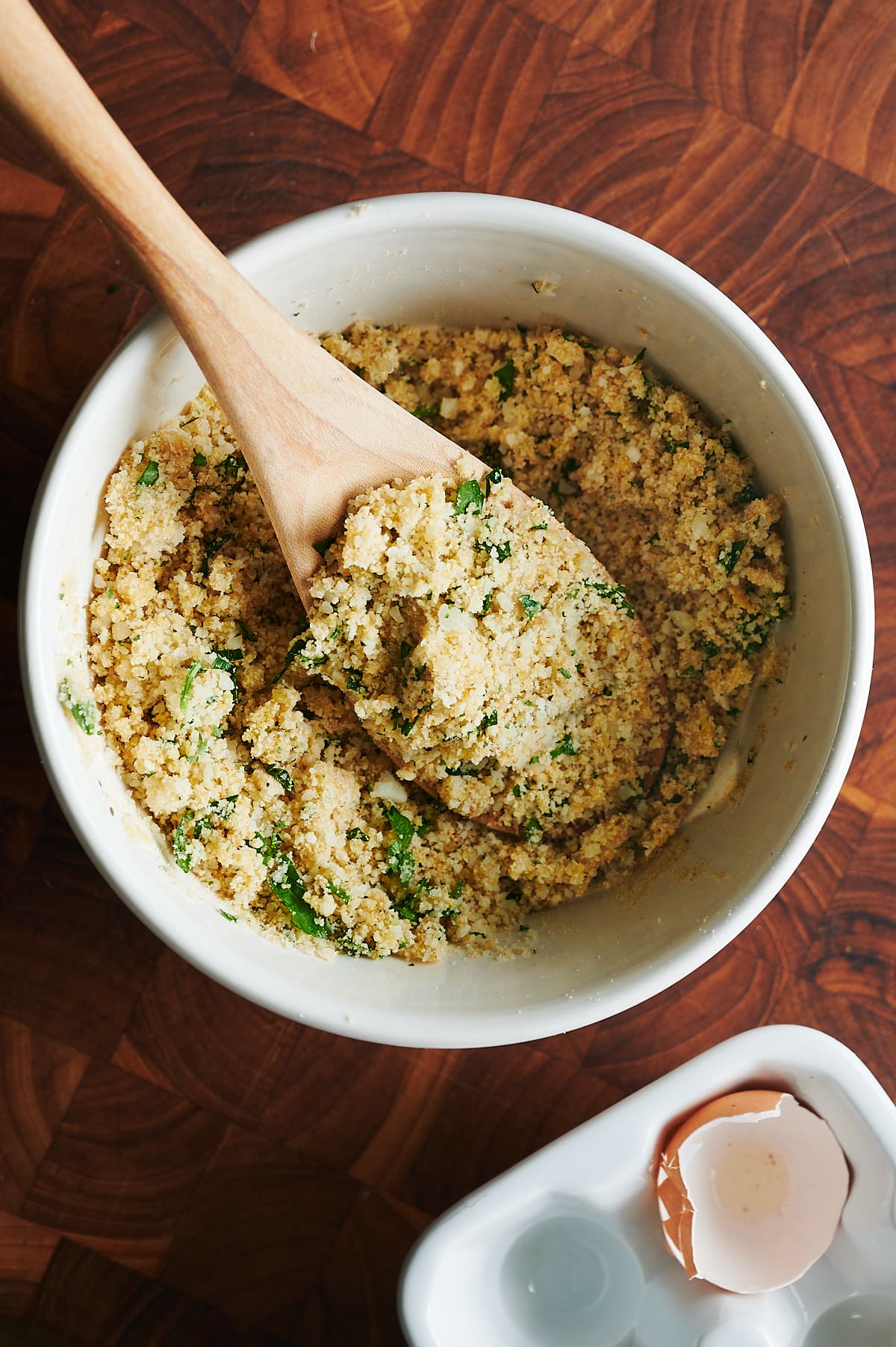 white bowl of braciole breadcrumb filling.