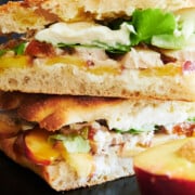 Closeup of burrata chicken sandwiches with peach.