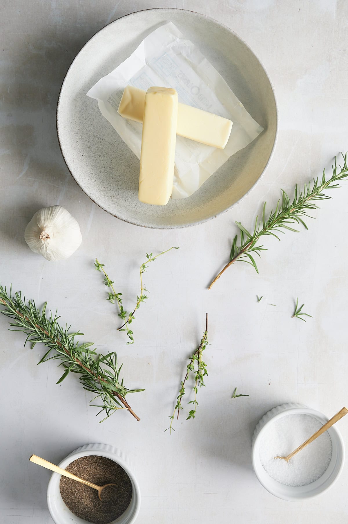 overhead shot of ingredients for garlic and herb compound butter.