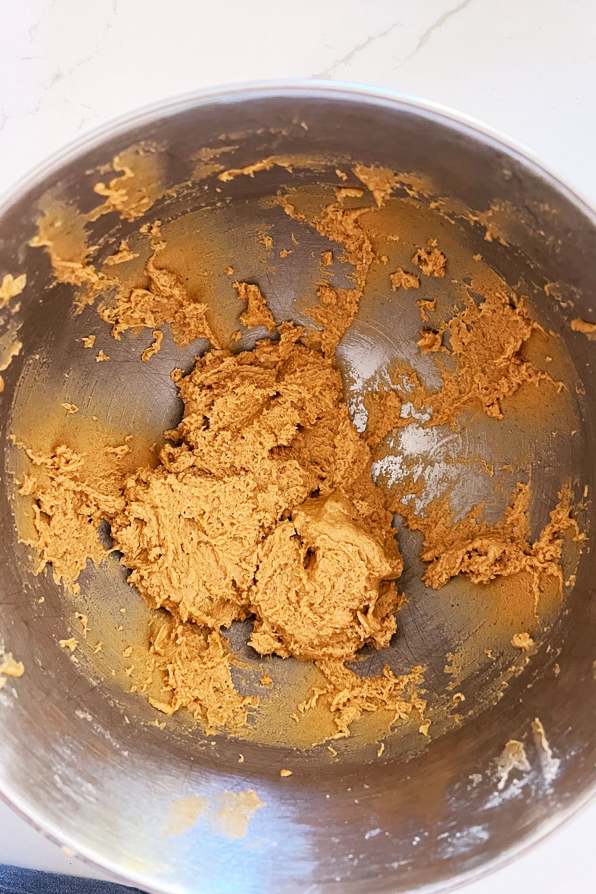 Mixing bowl of pumpkin biscotti dough.