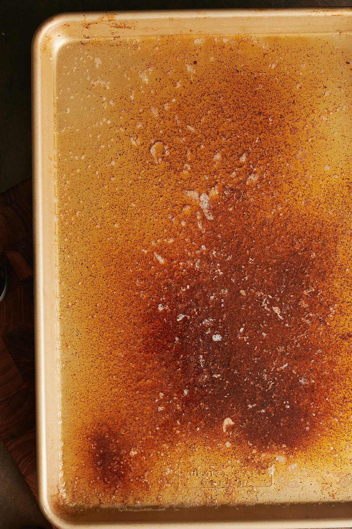 Sheet pan of seasoned melted butter.