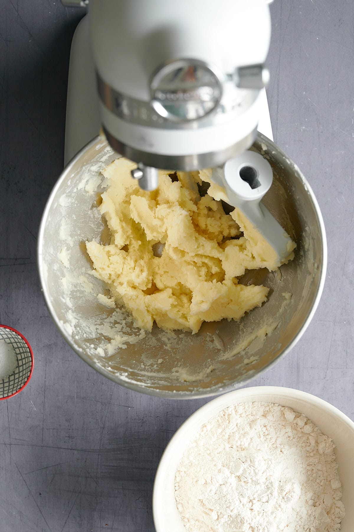 Stand mixer mixing butter for cookie dough.